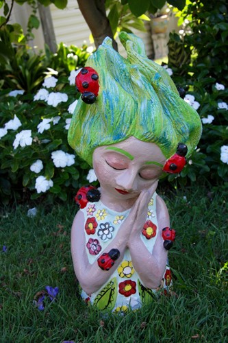 Small Garden Dweller with Green Hair and Lady Bugs