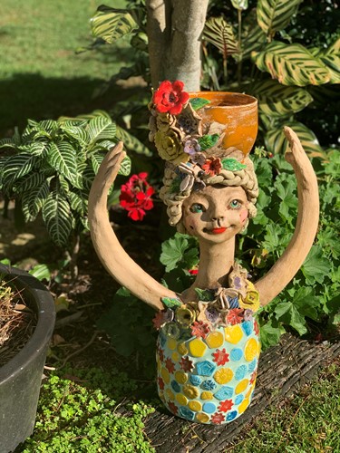 Pottery Girl with Pot on Head