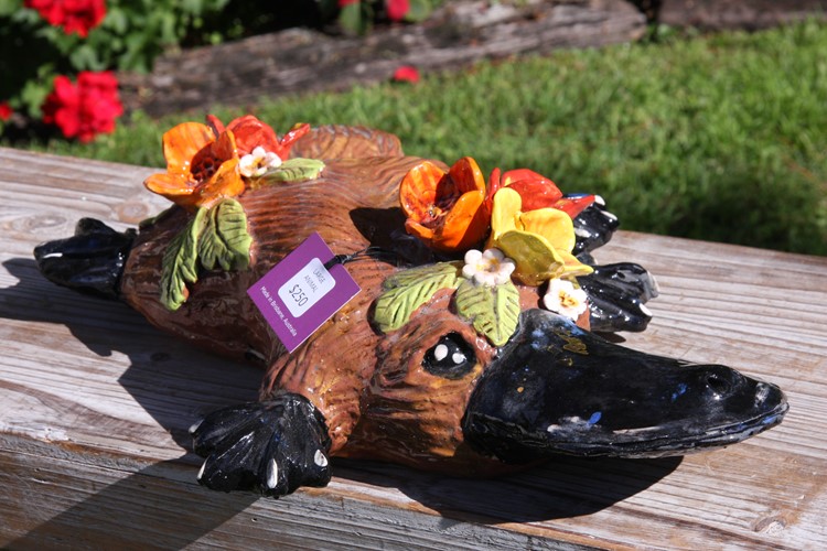 Pottery Platypus with Orange Flowers