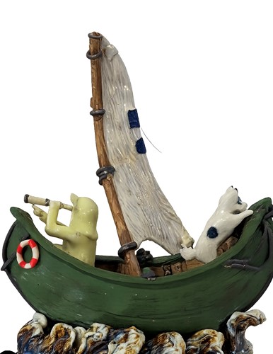 Boy and his dog 'Spot' in their Pea Green Boat called 'out there'